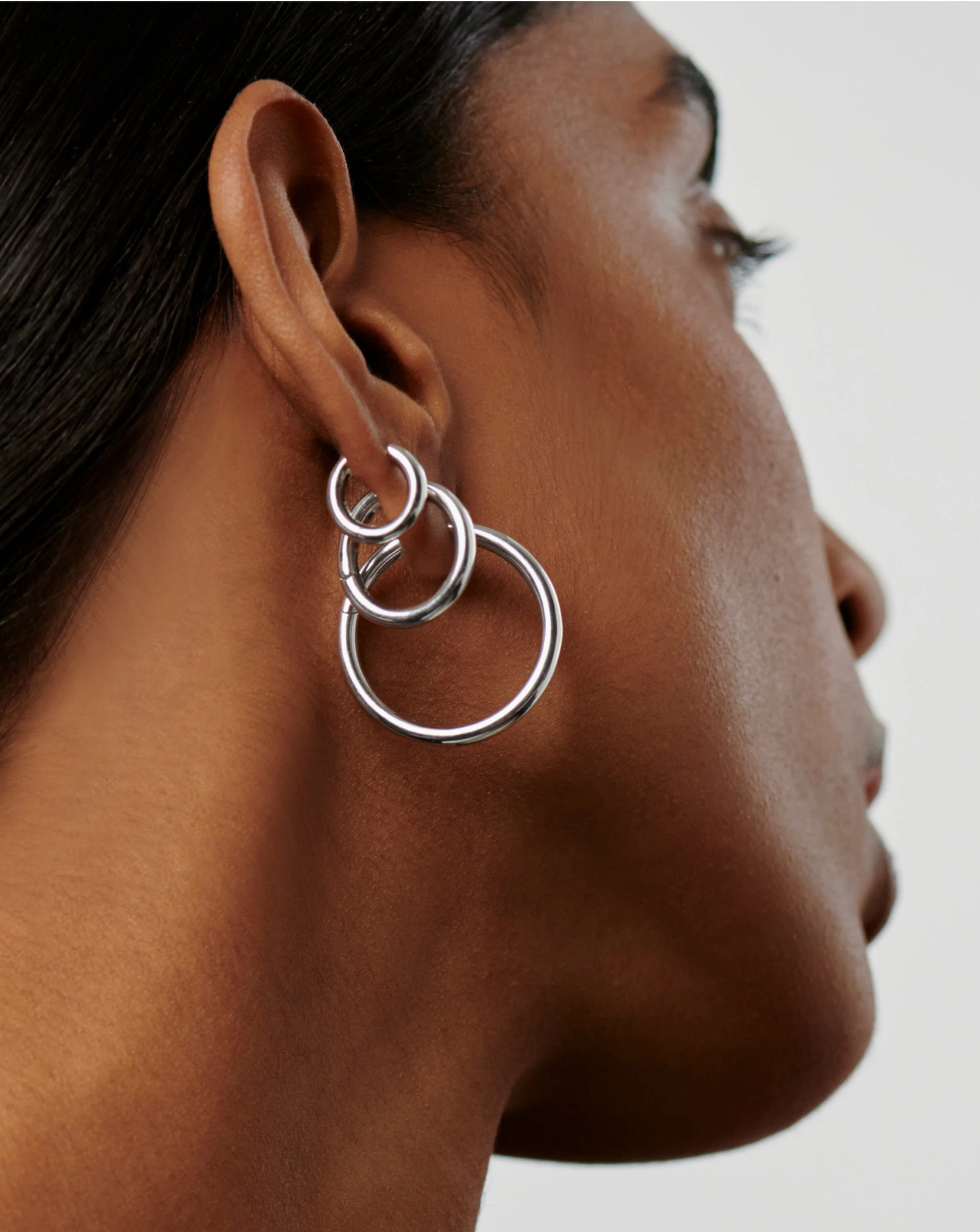 Classic Tunnel Mini Hoop Earrings | Sterling Silver - Image 2